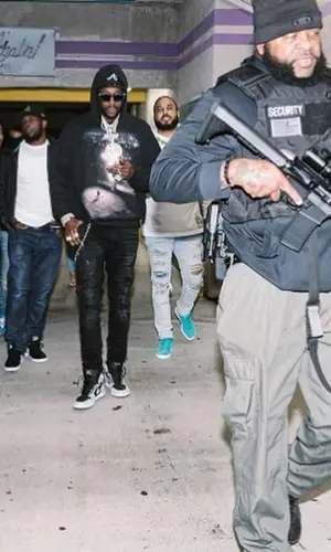 2 Chainz wearing 1989 Studio hoody