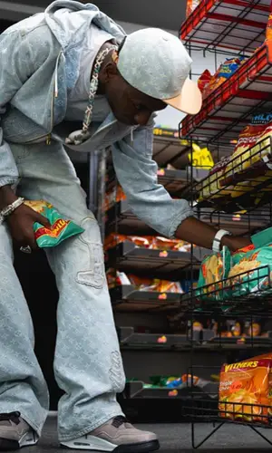 Young Dolph wearing Louis Vuitton pants