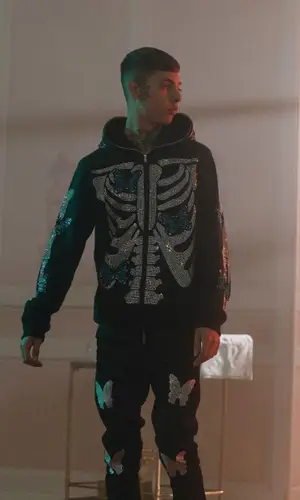 Natanael Cano wearing Outsiderz hoody