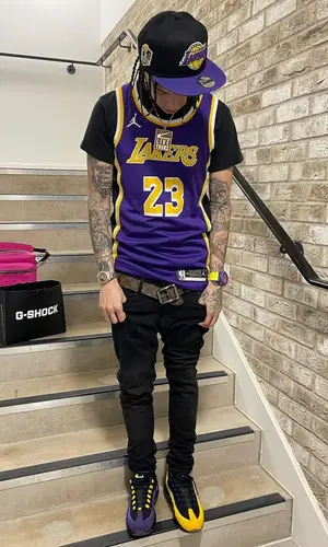Central Cee wearing Louis Vuitton bag