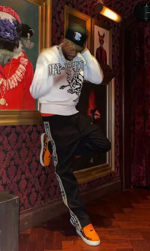 Meek Mill wearing Off-White sweater