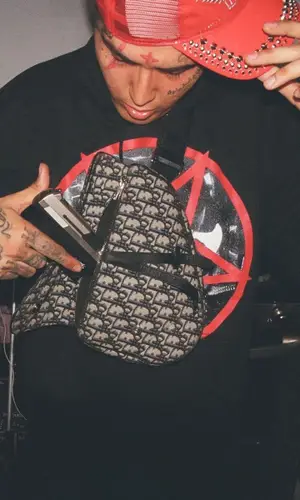 Sosmula wearing Rick Owens sneakers