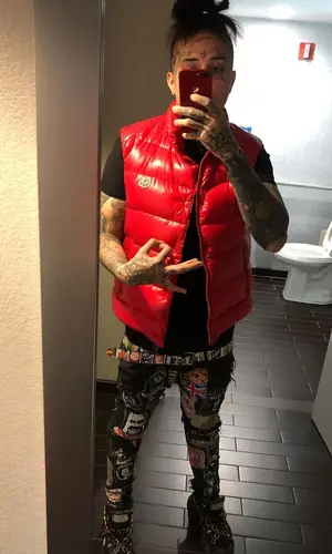 Sosmula wearing Gucci sneakers