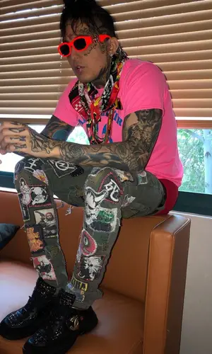 Sosmula wearing Versace eyewear