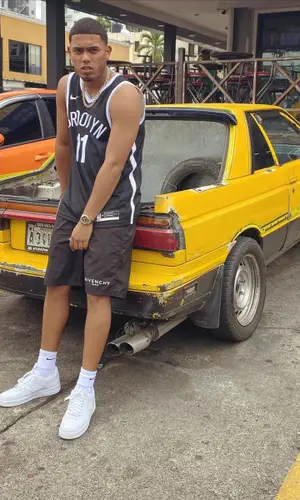 Myke Towers wearing Nike sock