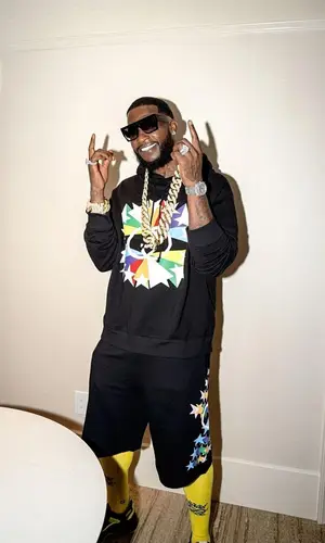 Gucci Mane wearing Gucci sweatshirt