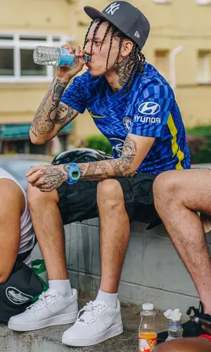 Central Cee wearing New Era cap
