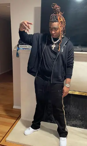 Lil Gotit wearing Chrome Hearts hoody