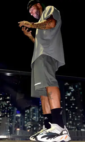 Nicky Jam wearing Adidas sock
