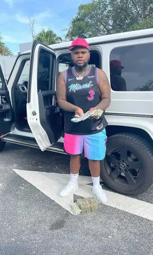 Fat Boy wearing Nike shorts