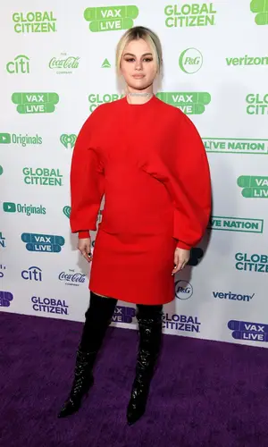 Selena Gomez wearing Stuart Weitzman boots