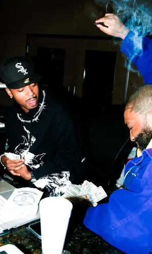Metro Boomin wearing Givenchy shorts