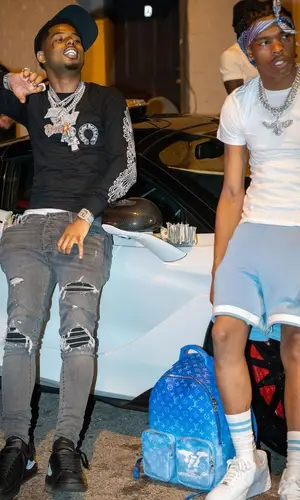 Pooh Shiesty’s Outfit in Chrome Hearts Sweatshirt, Amiri Jeans & Alexander McQueen Sneakers (2021)