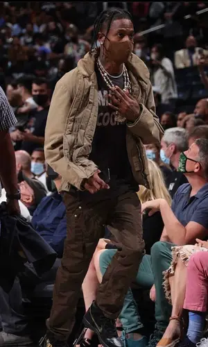 Travis Scott wearing Nike sneakers