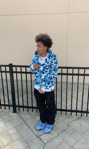 Mikey wearing Bape hoody