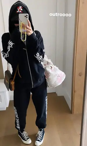 Madison Beer wearing Converse sneakers