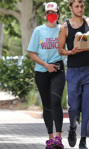 Dua Lipa wearing Palace t-shirt