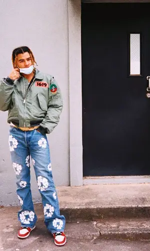 24kGoldn wearing Levi’s jeans