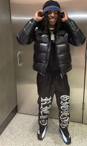 OMB Peezy wearing Moncler jacket
