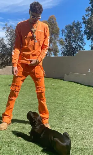 LaMelo Ball wearing Louis Vuitton belt