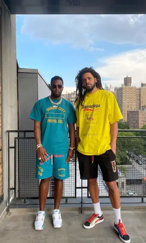 J. Cole wearing Puma sneakers