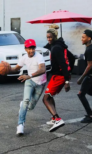 21 Savage wearing Chrome Hearts t-shirt