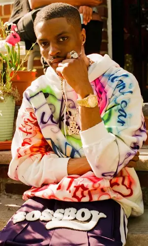 Pierre Bourne wearing Baby Brush sweatshirt