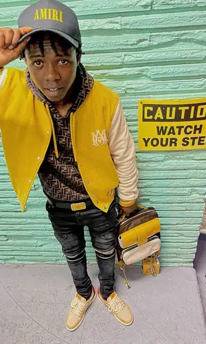 Jackboy wearing Fendi backpack