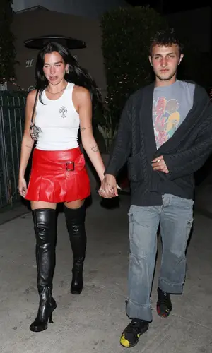 Dua Lipa wearing Prada boots