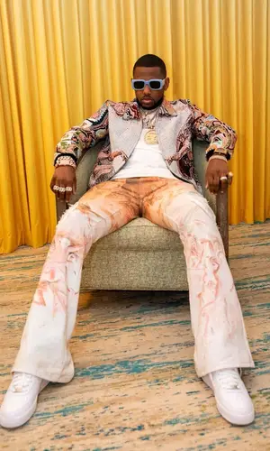 Fabolous wearing Louis Vuitton backpack