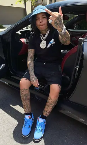 Young M.A wearing Philipp Plein t-shirt