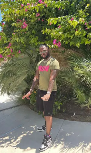 Headie One wearing Moncler shorts