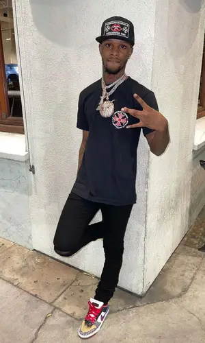 Toosii wearing Chrome Hearts other