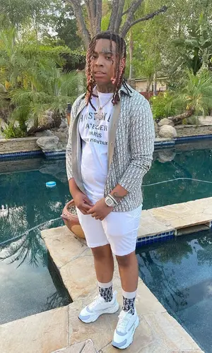 Lil Gotit wearing Dior shirt