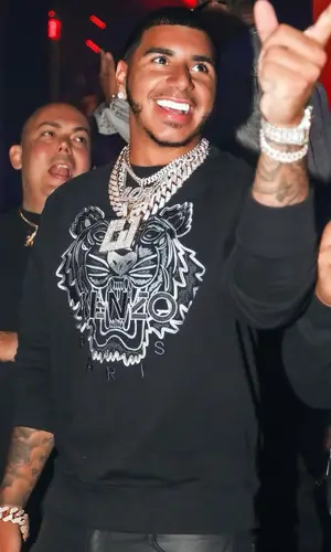CJ wearing Kenzo sweatshirt