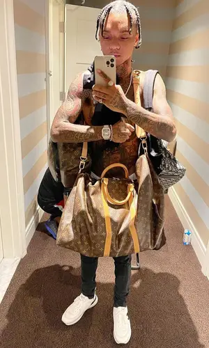 Swae Lee wearing Dior backpack