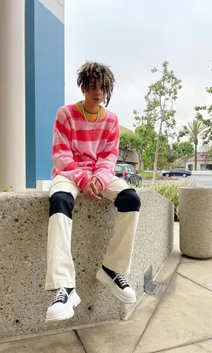 Iann Dior’s Outfit in ERL Sweater, Marni Jeans & Alexander McQueen Sneakers (2021)