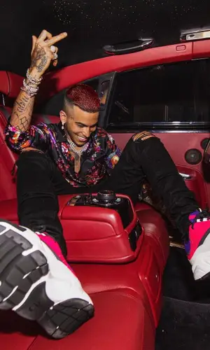 Sfera Ebbasta wearing Dior shirt