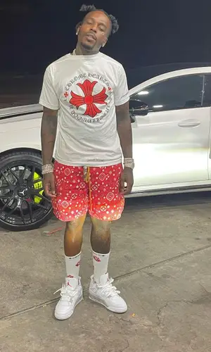 Sauce Walka wearing Chrome Hearts sock