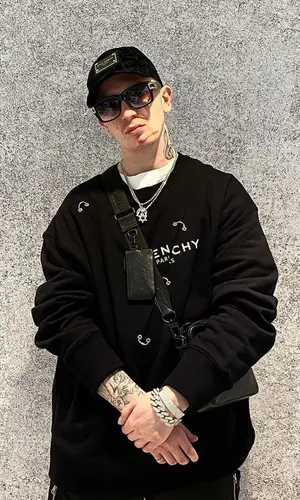 Yung Trappa wearing Louis Vuitton bag