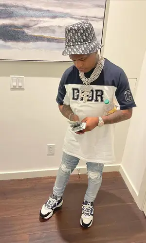 Rylo Rodriguez wearing Dior cap