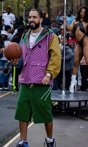 French Montana wearing Gucci shorts