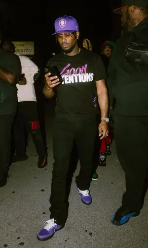 BRS Kash wearing Vlone t-shirt