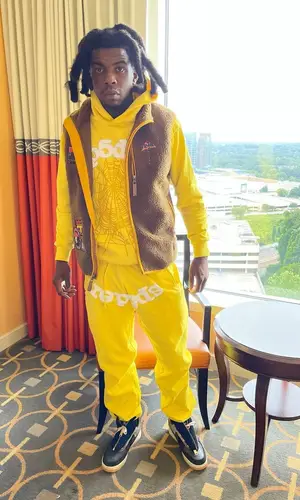 Yak Gotti wearing Young Thug Merch pants