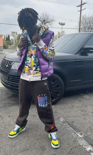 Pasto Flocco wearing Travis Scott Merch pants