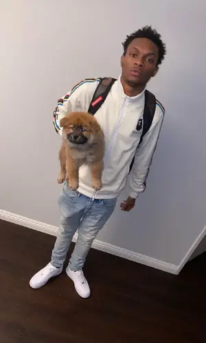 Lil Eazzyy wearing Bape jacket