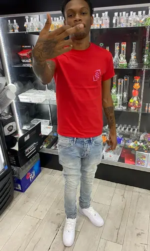 Lil Eazzyy wearing Supreme sneakers