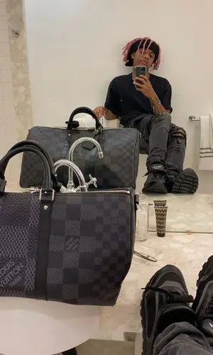 SoFaygo wearing Ksubi jeans
