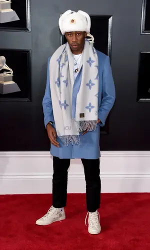 Tyler, The Creator’s Outfit in Supreme Jacket, Converse Sneakers & Louis Vuitton Scarf (2018)