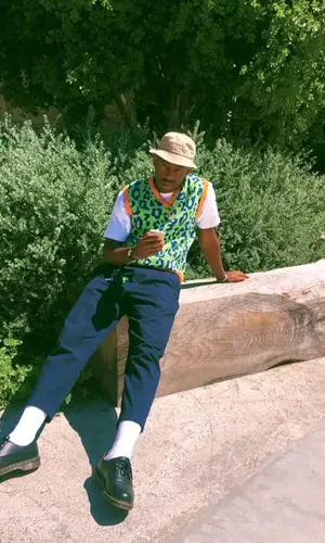 Tyler, The Creator’s Outfit in Golf Wang Top, Supreme Pants & Dr. Martens Sneakers (2019)